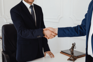 lawyer and client shaking hands