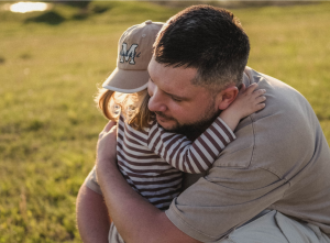 Parent hugging child