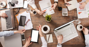 Table view of business and real estate family law legal team meeting