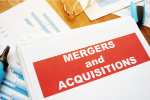 Mergers and Acquisitions files on desk