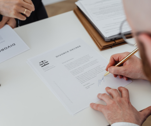 Step-by-step Texas divorce filing paperwork on a desk at an Austin family law office