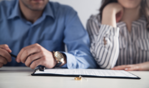 Austin family lawyer explaining Texas no-fault divorce grounds to a client